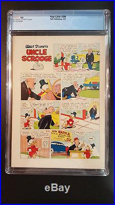 Four Color #386 Walt Disney's Uncle Scrooge CGC 9.0 Mar 1952 DONALD DUCK HUEY