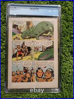 Four Color #596 CGC 7.0 OWithW 1st Turok Son of Stone NICE! Dell 1954