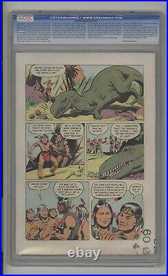 Four Color #596 CGC 7.0 (OWithW) FN/VF 1st app. Of Turok, Son of Stone Dell 1954