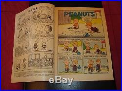 Four Color #878 Peanuts (Feb 1958, Dell) 15 Cent Snoopy Charlie Brown CGC it