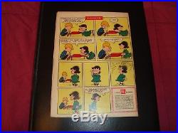 Four Color #878 Peanuts (Feb 1958, Dell) 15 Cent Snoopy Charlie Brown CGC it